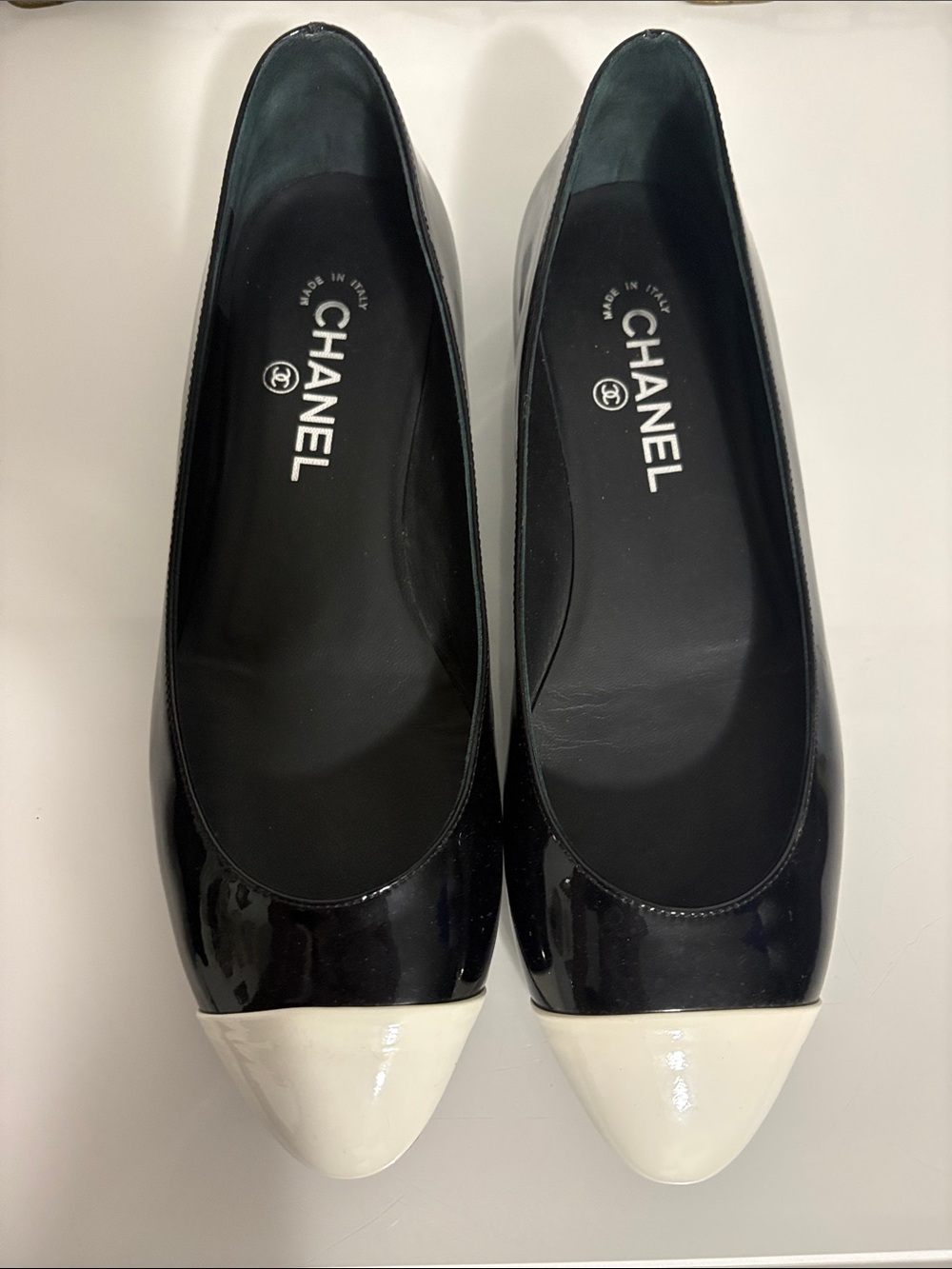 CHANEL Black and White Patent Leather Cap-Toe Ballet Flats
